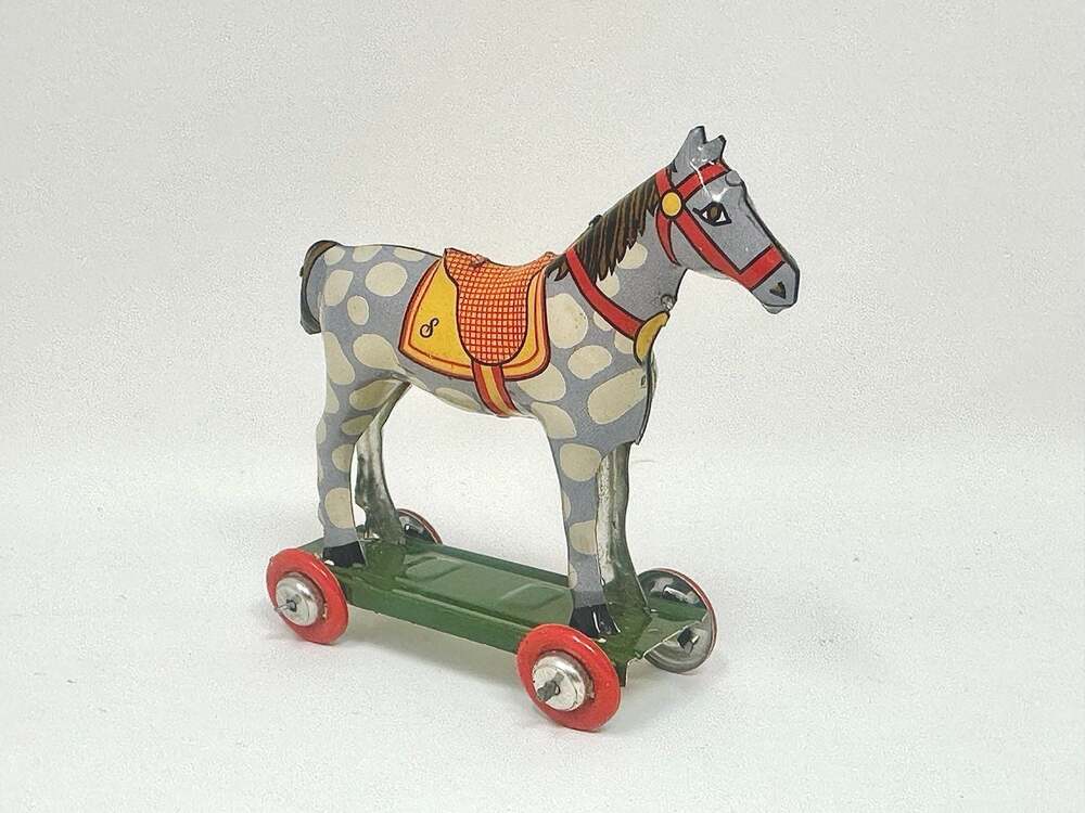 Miniature Tin Toy Horse on Wheels Vintage Penny Toy Ornament by Schylling